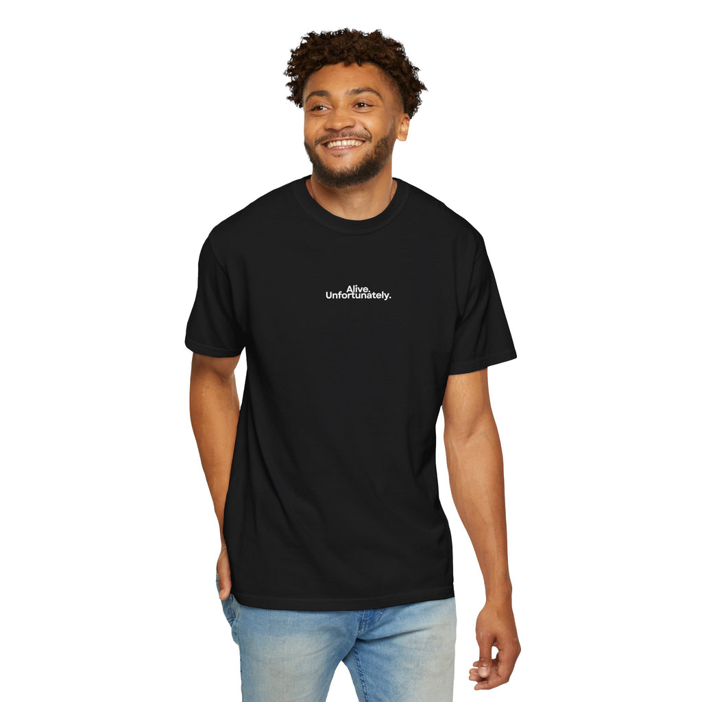 Man wearing a black t-shirt with 'Alive. Unfortunately.' text on a white background
