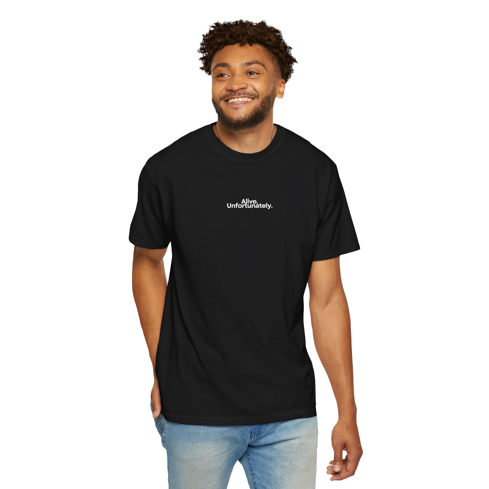 Man wearing a black t-shirt with 'Alive. Unfortunately.' text on a white background