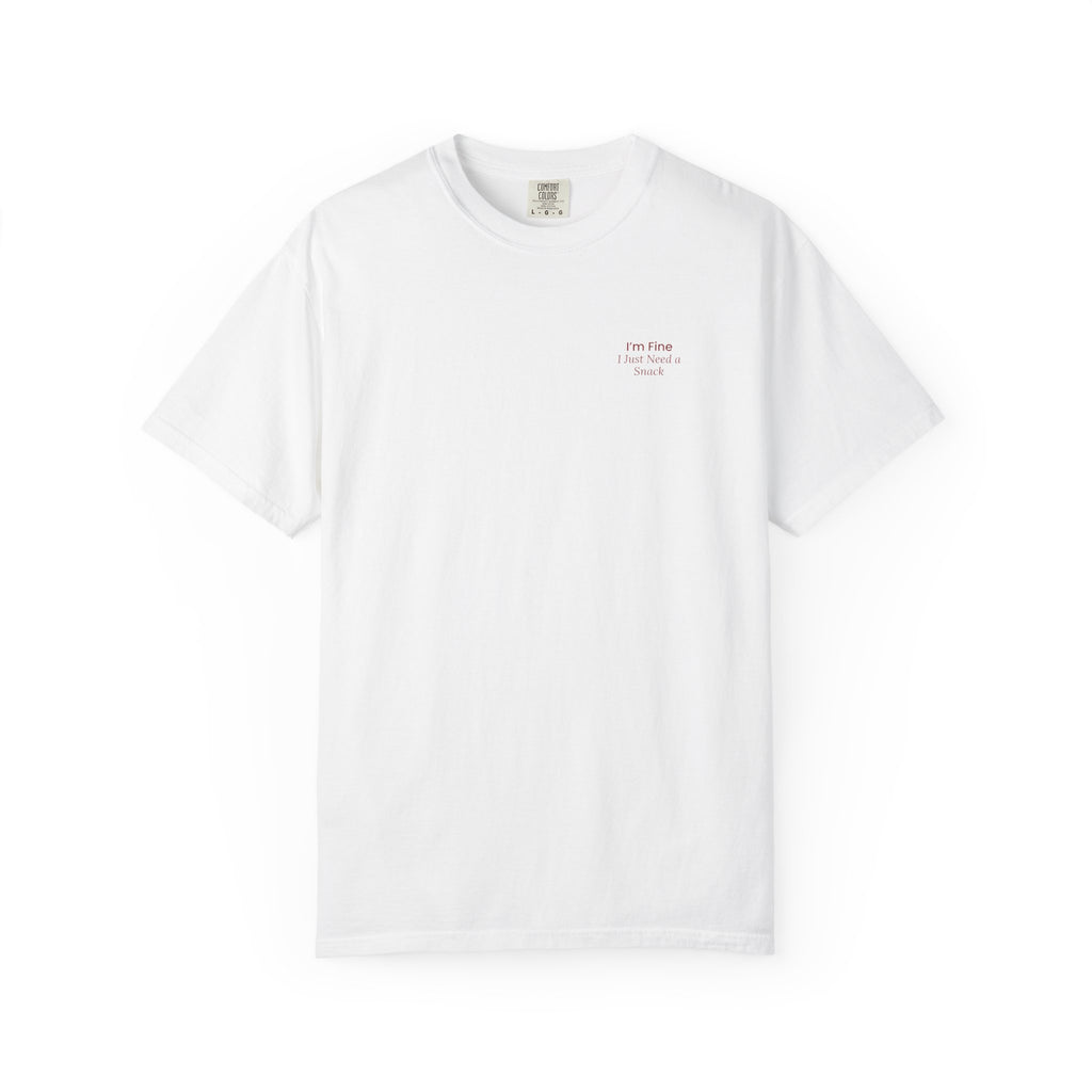 White t-shirt with text 'I'm Fine, I Just Need a Snack' on a white background