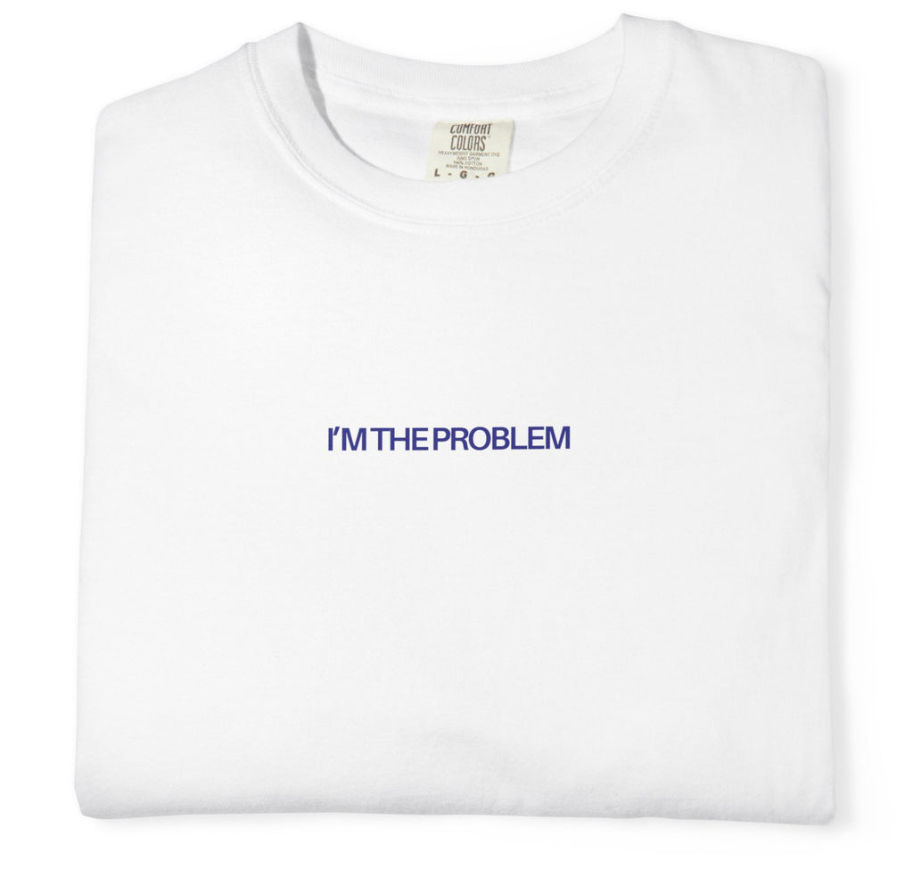 White t-shirt with 'I'm the Problem' text in blue on a white background