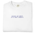 White t-shirt with text 'DOING MY BEST (IT'S NOT GREAT)' on a white background